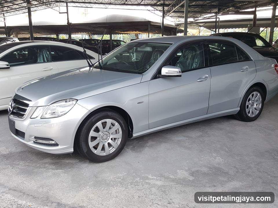 Silver Mercedes E-Class Sedan in Car Lot