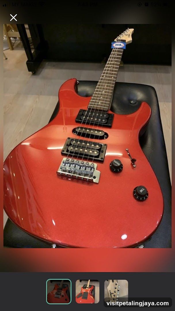 Red Electric Guitar on Display