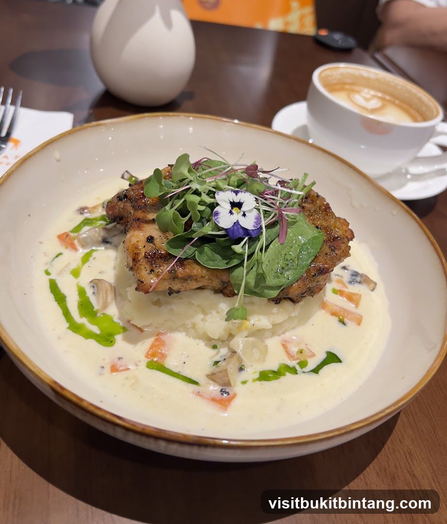 Chicken dish with mashed potatoes and sauce