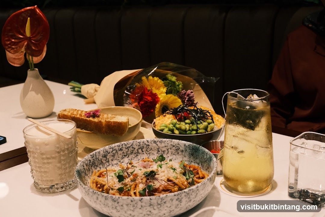 Table Setting with Food and Flowers