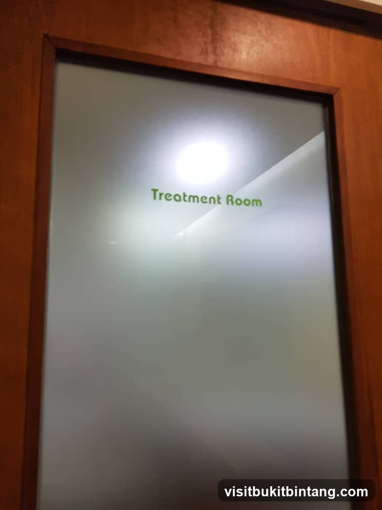 Frosted Glass Door with "Treatment Room" Label