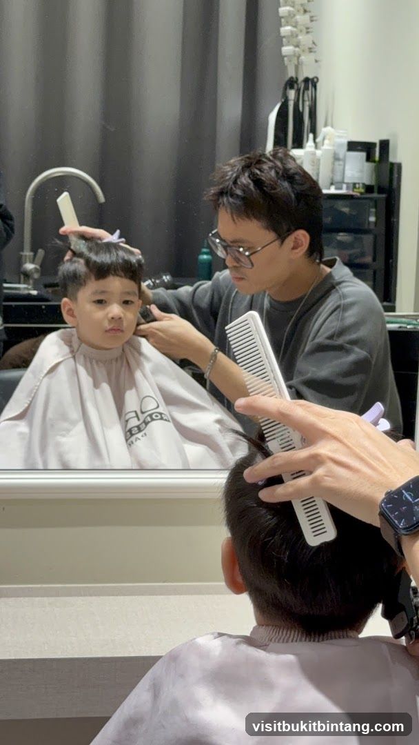 Barber cutting a child's hair