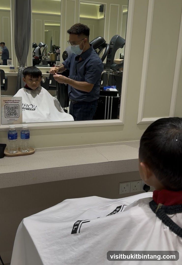 Barber cutting a child's hair