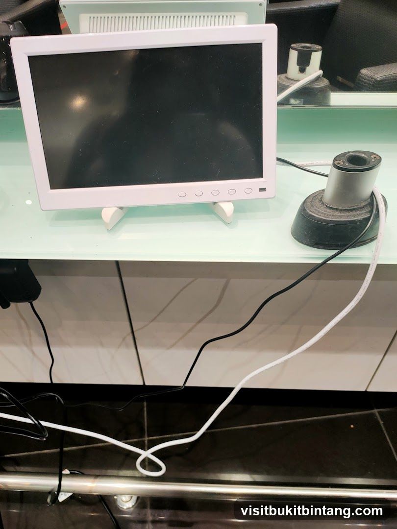 Computer monitor and accessories on a desk