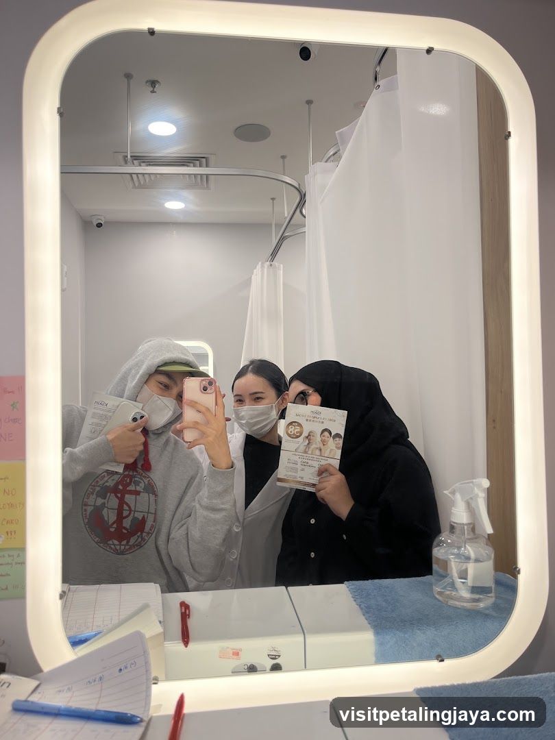 Mirror selfie in a medical or spa room