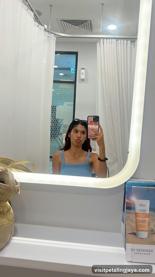Mirror selfie in a bathroom or spa area
