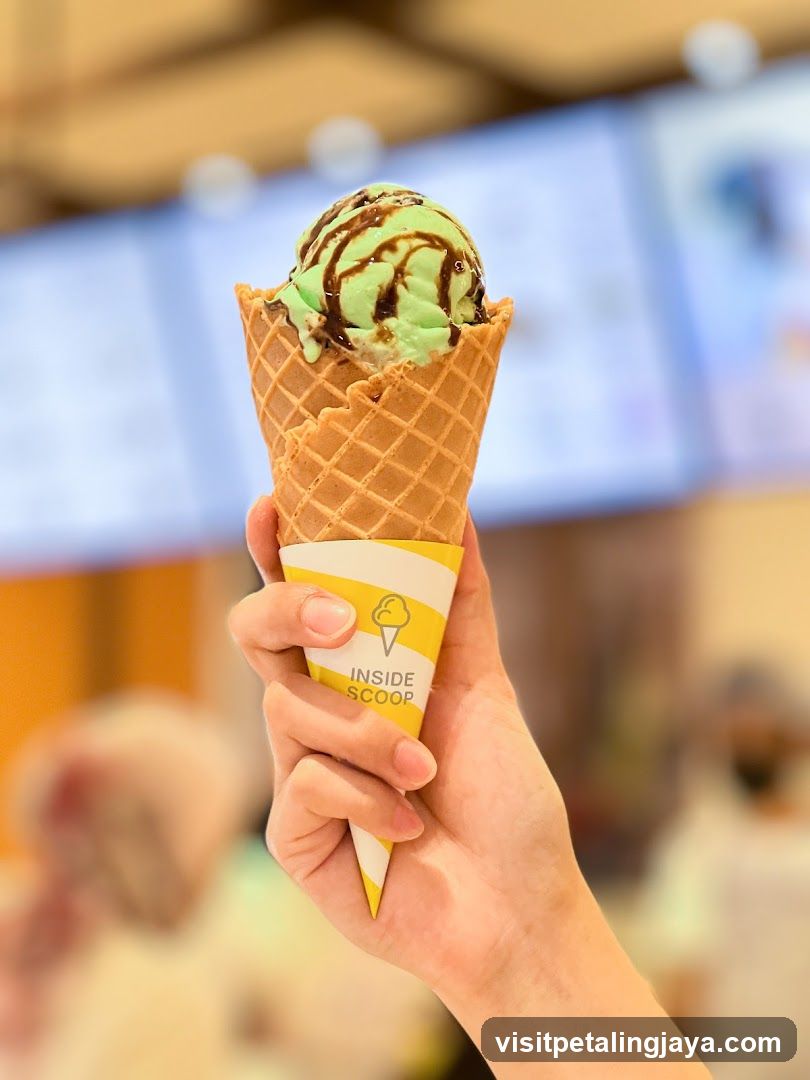 Ice Cream Cone with Green and Chocolate Flavors