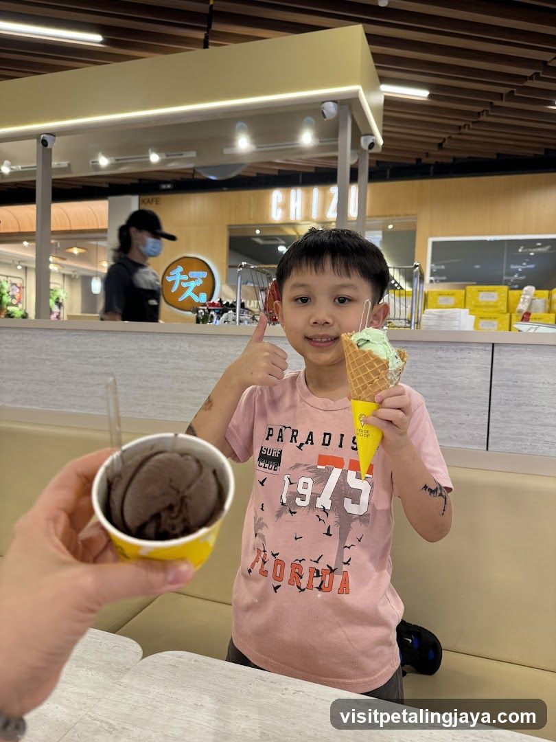 Child with Ice Cream in Mall Food Court