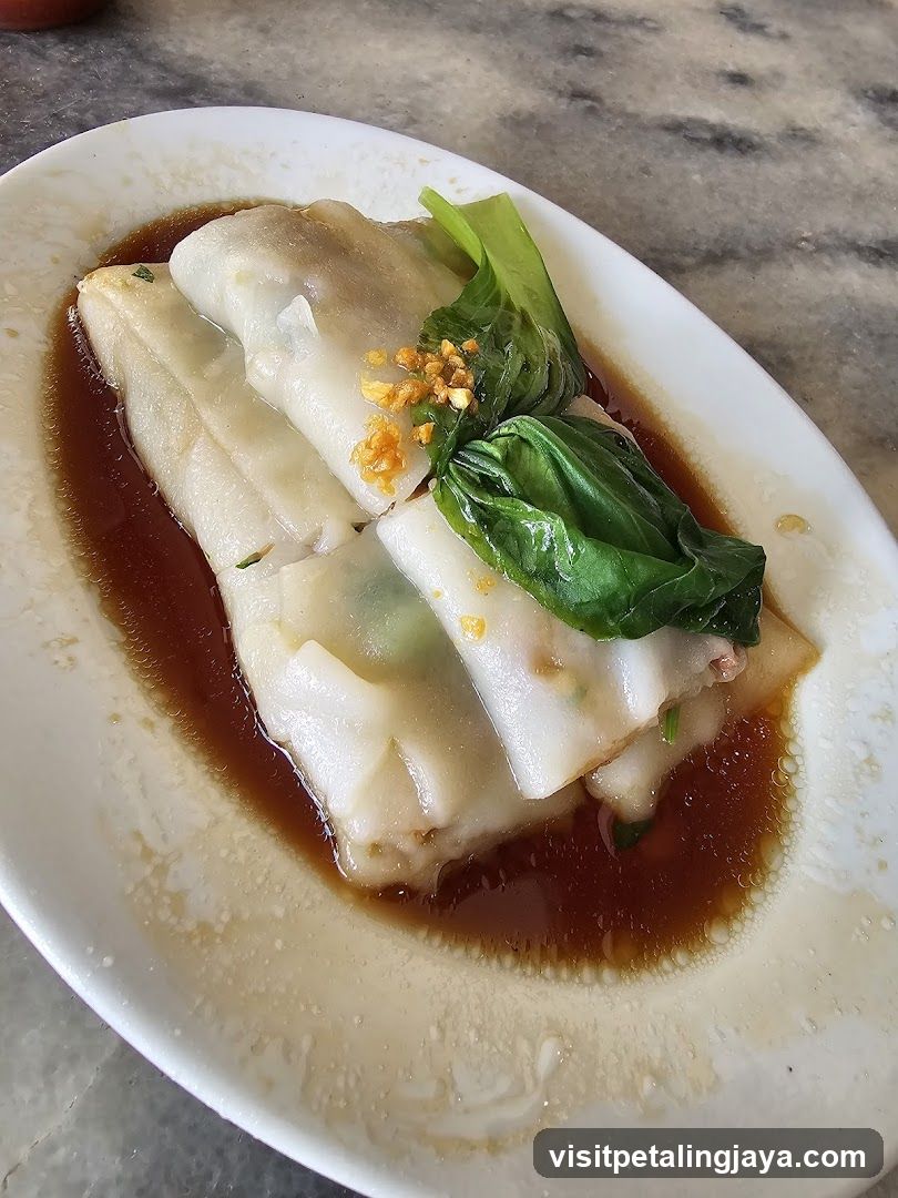 Steamed Rice Rolls with Sauce and Garnish