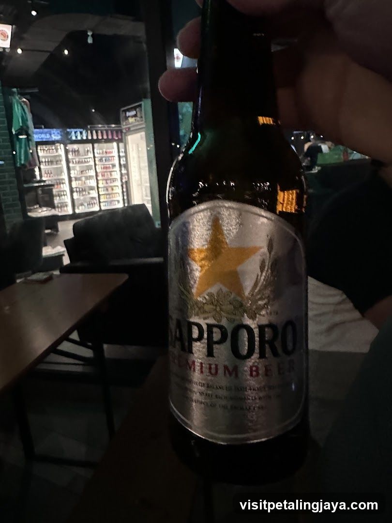 Sapporo Beer Bottle in Bar Interior