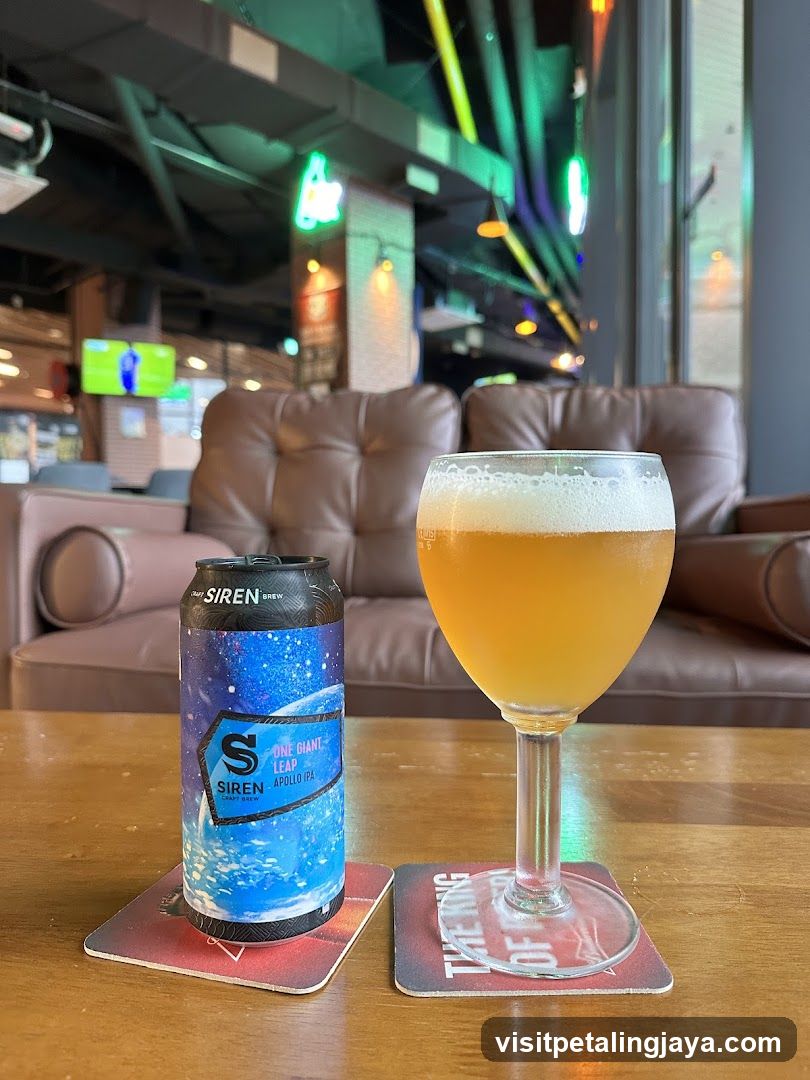 Siren Beer Can and Glass on Table