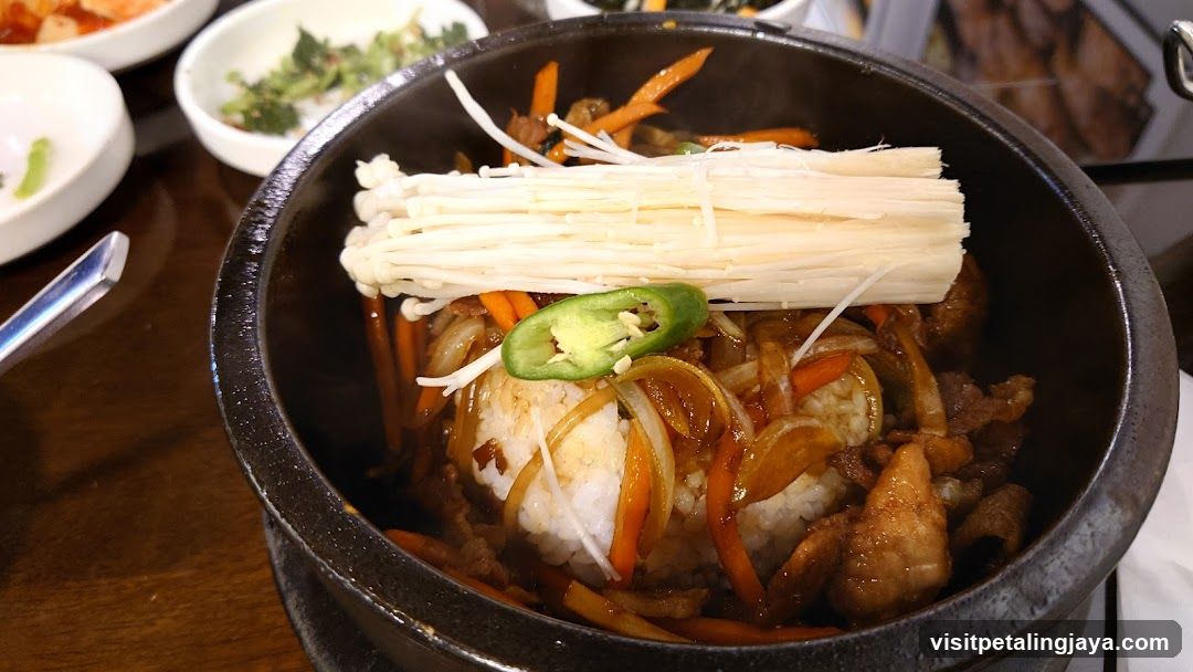 Stone Pot Rice Bowl with Enoki Mushrooms and Vegetables