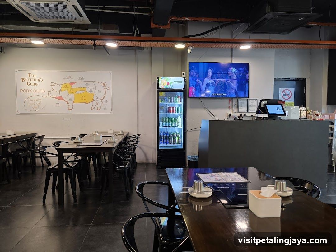 Restaurant Interior with Pork Cut Chart and TV Screen