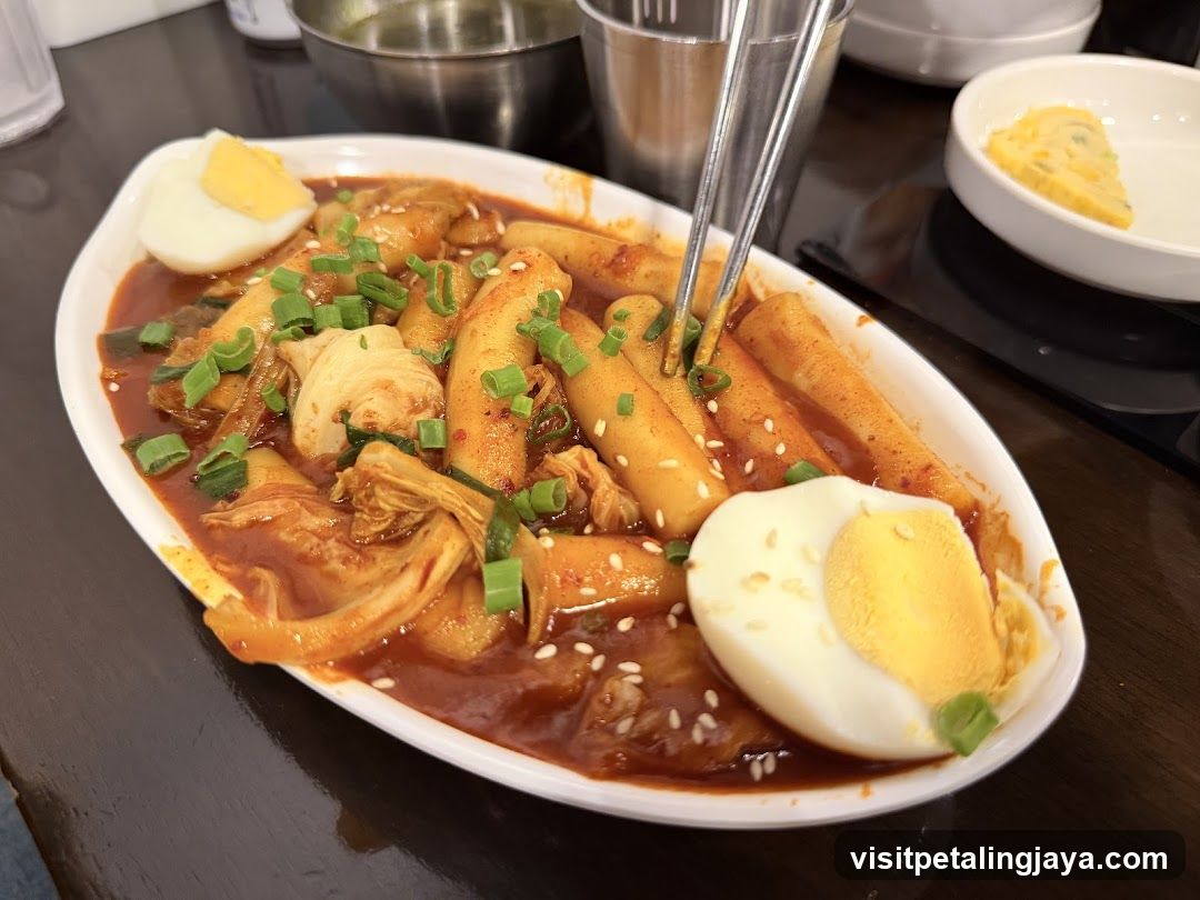 Korean Tteokbokki with Egg and Kimchi