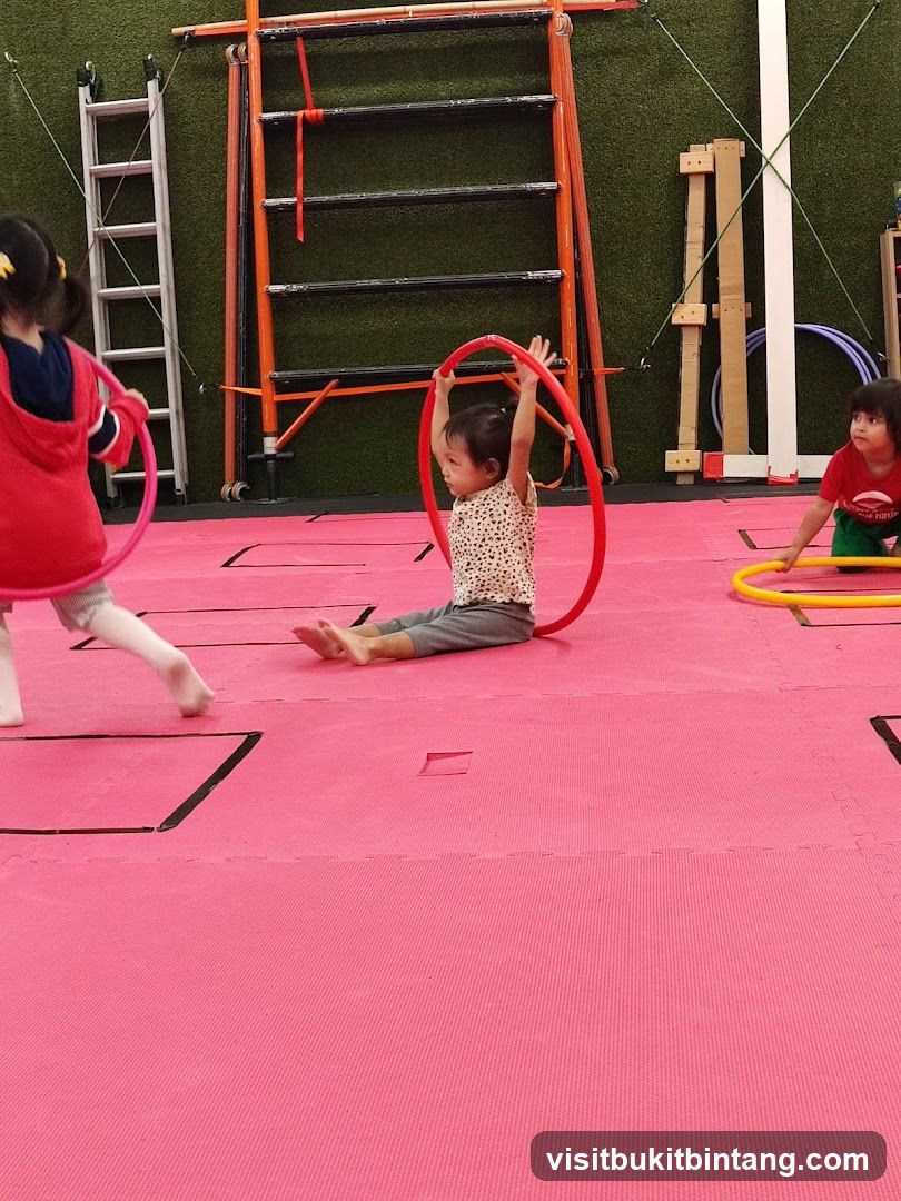 Children practicing with hoops
