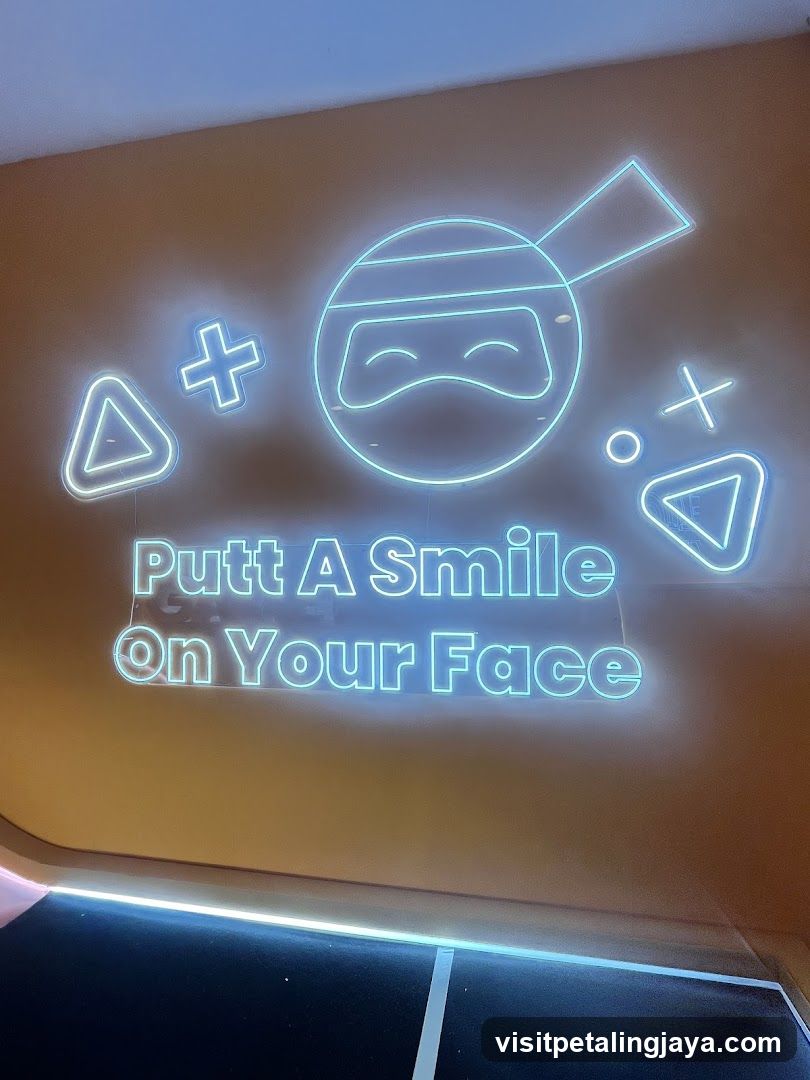 Neon Signage with Ninja and Play Button Symbols