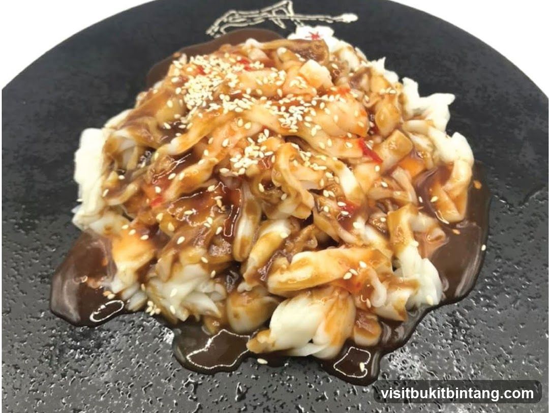 Noodle Dish with Sauce and Sesame Seeds