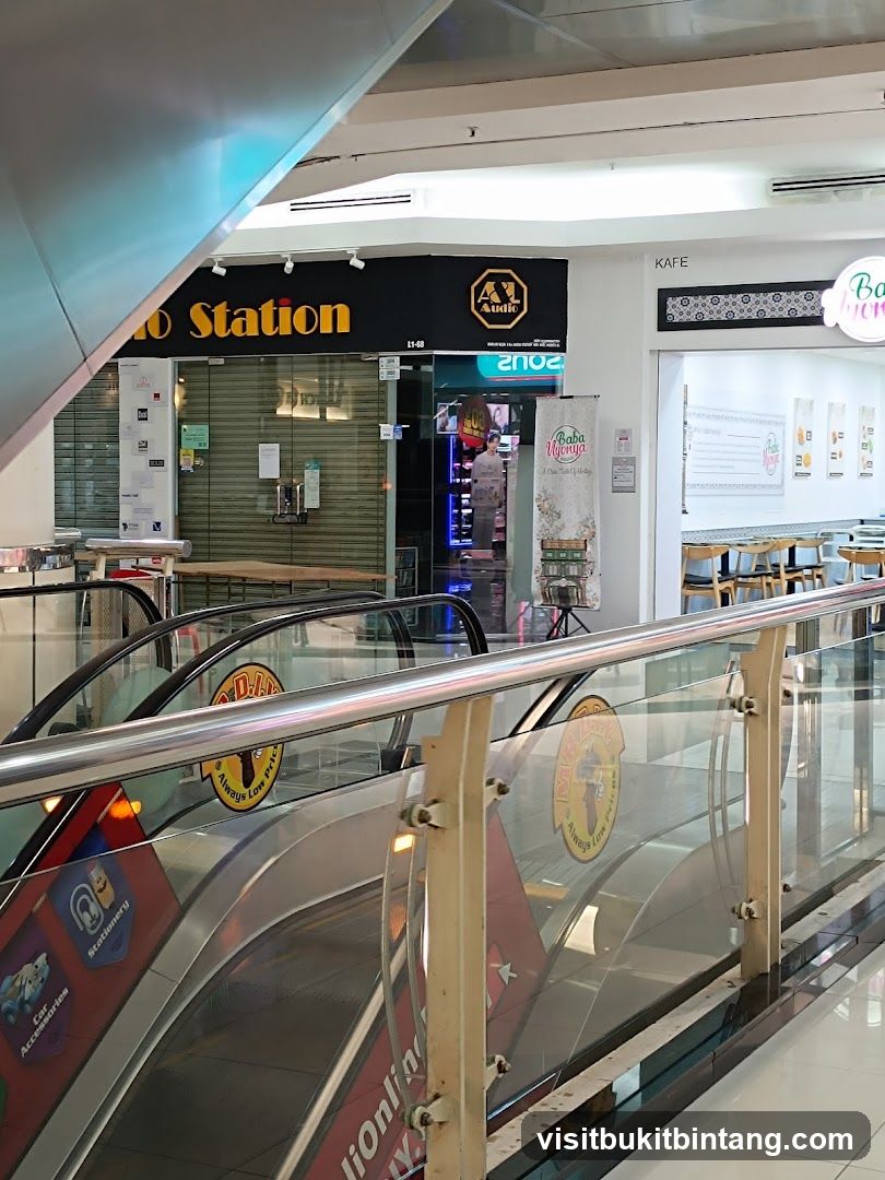 Mall Interior with Escalators and Shops