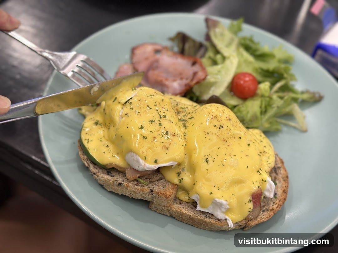 Eggs Benedict with Bacon and Salad