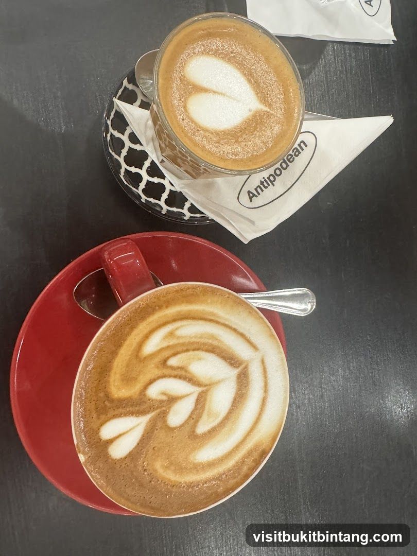 Two coffees with latte art