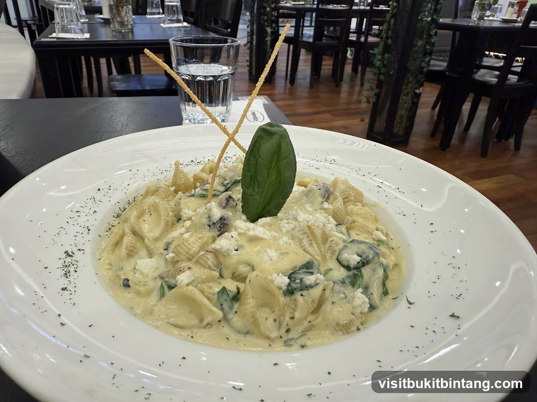 Pasta dish with cheese and spinach