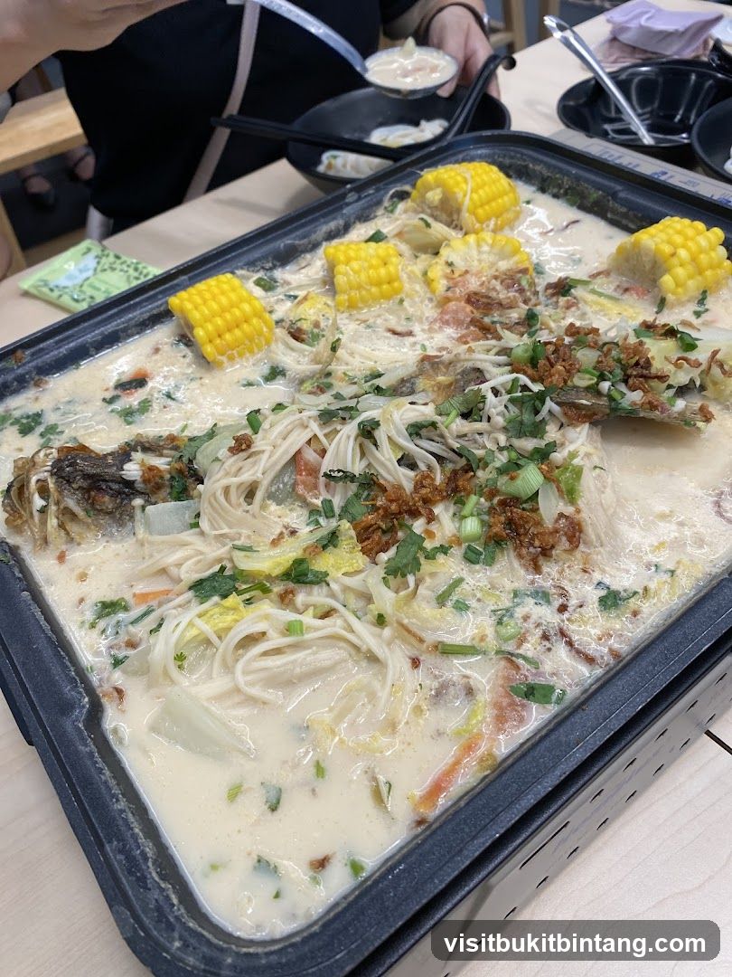 Creamy Fish Soup with Noodles and Corn