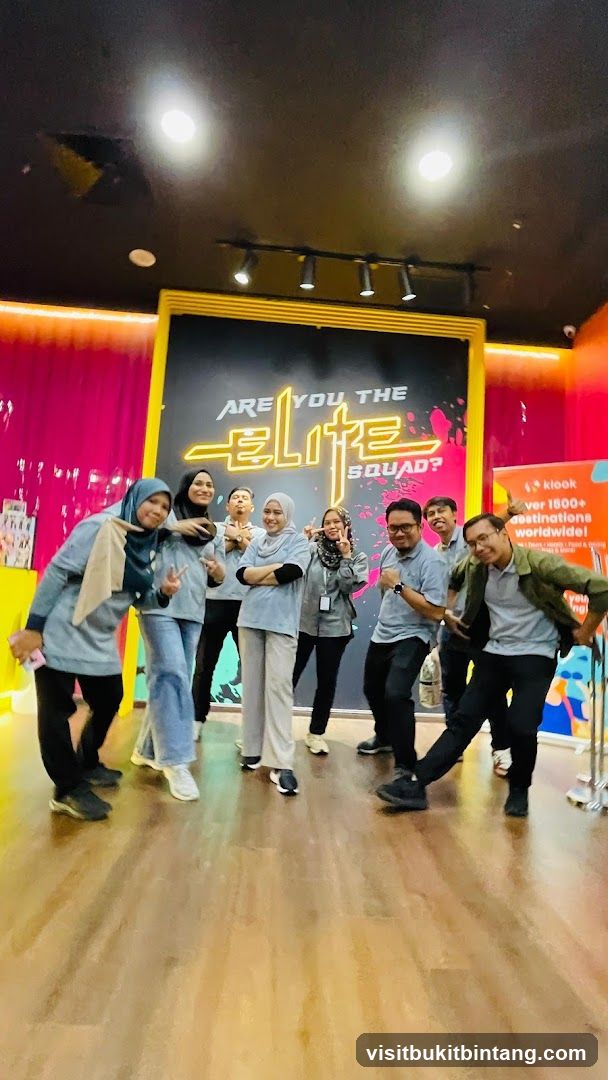 Group Posing in Front of a Neon Sign