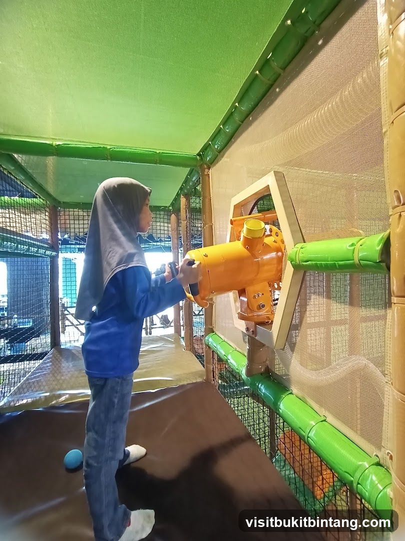 Child playing in indoor playground