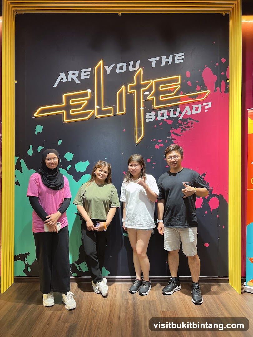 Group Posing in Front of Neon Sign
