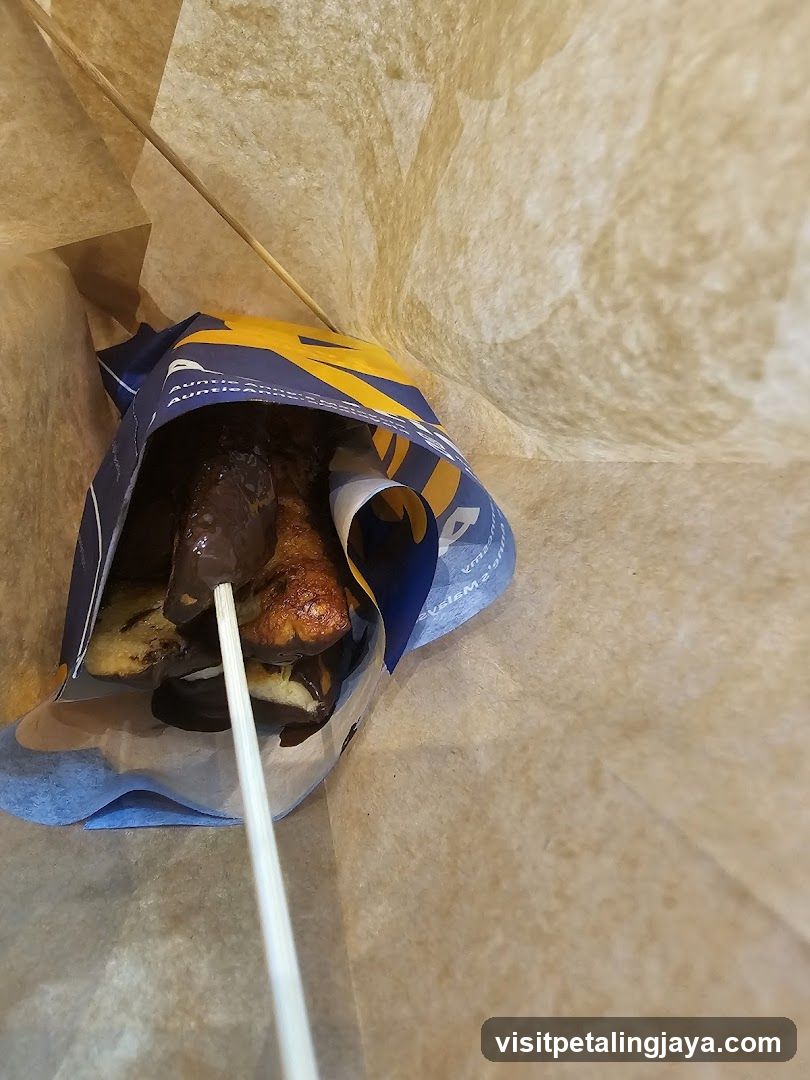 Chocolate-covered pastry in bag
