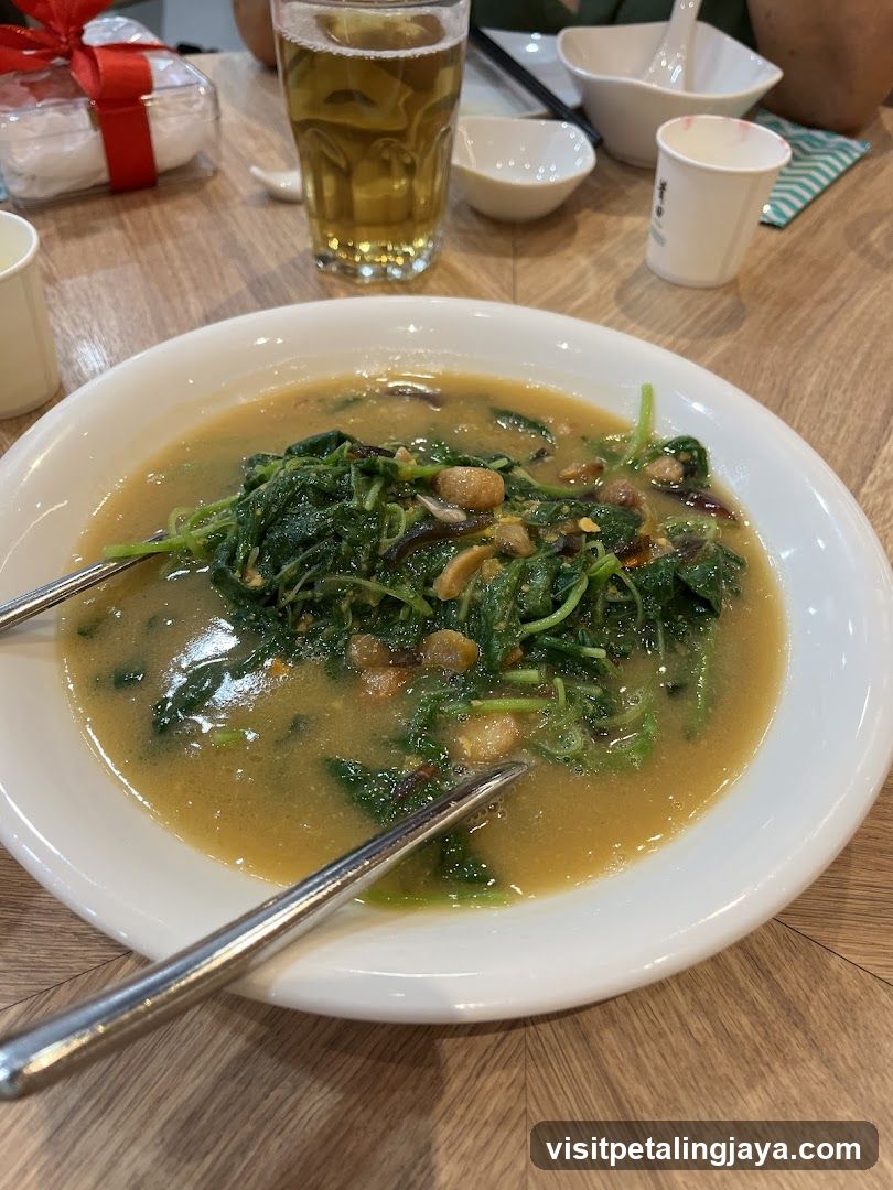 Dish with greens and broth