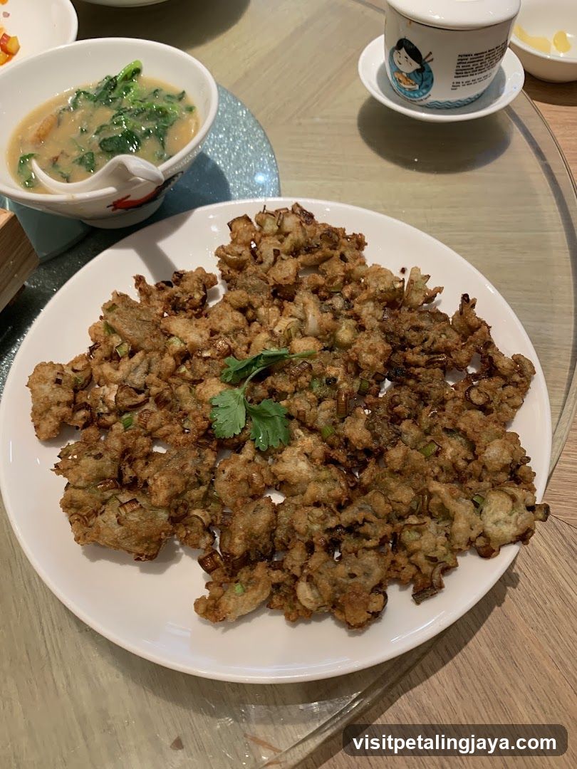 Fried Food Dish with Soup and Tea