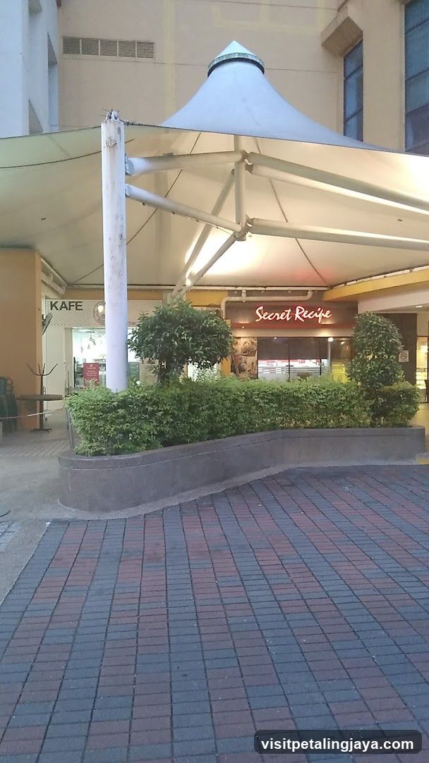 Outdoor Mall Entrance with Storefronts