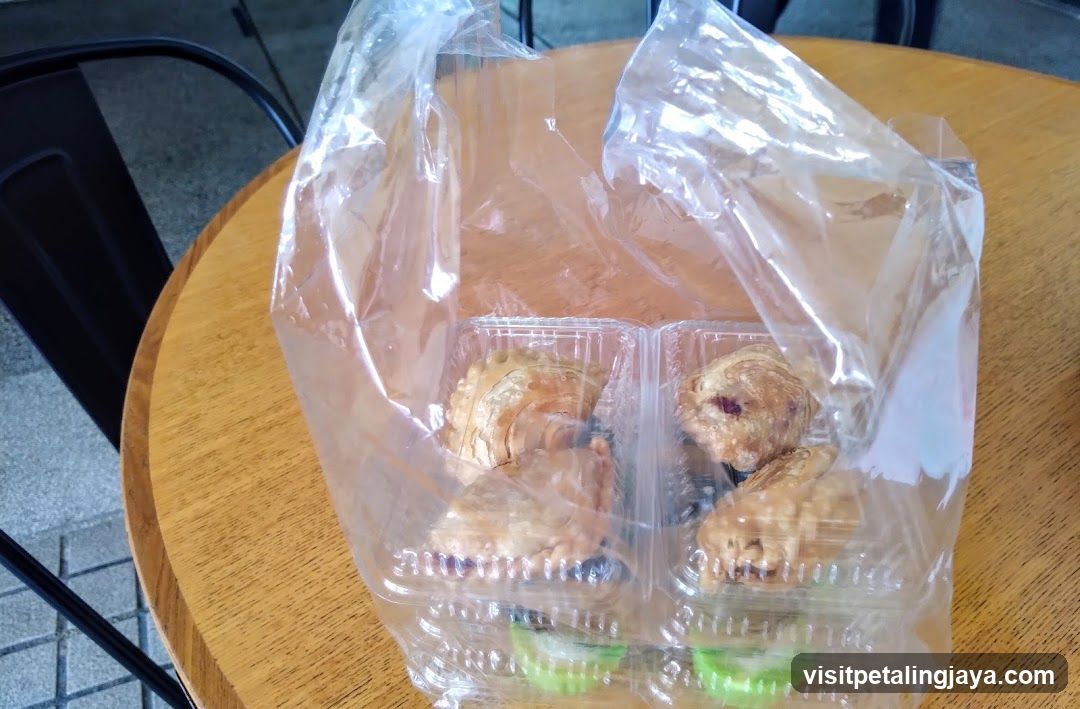 Plastic Bag with Pastries on Table