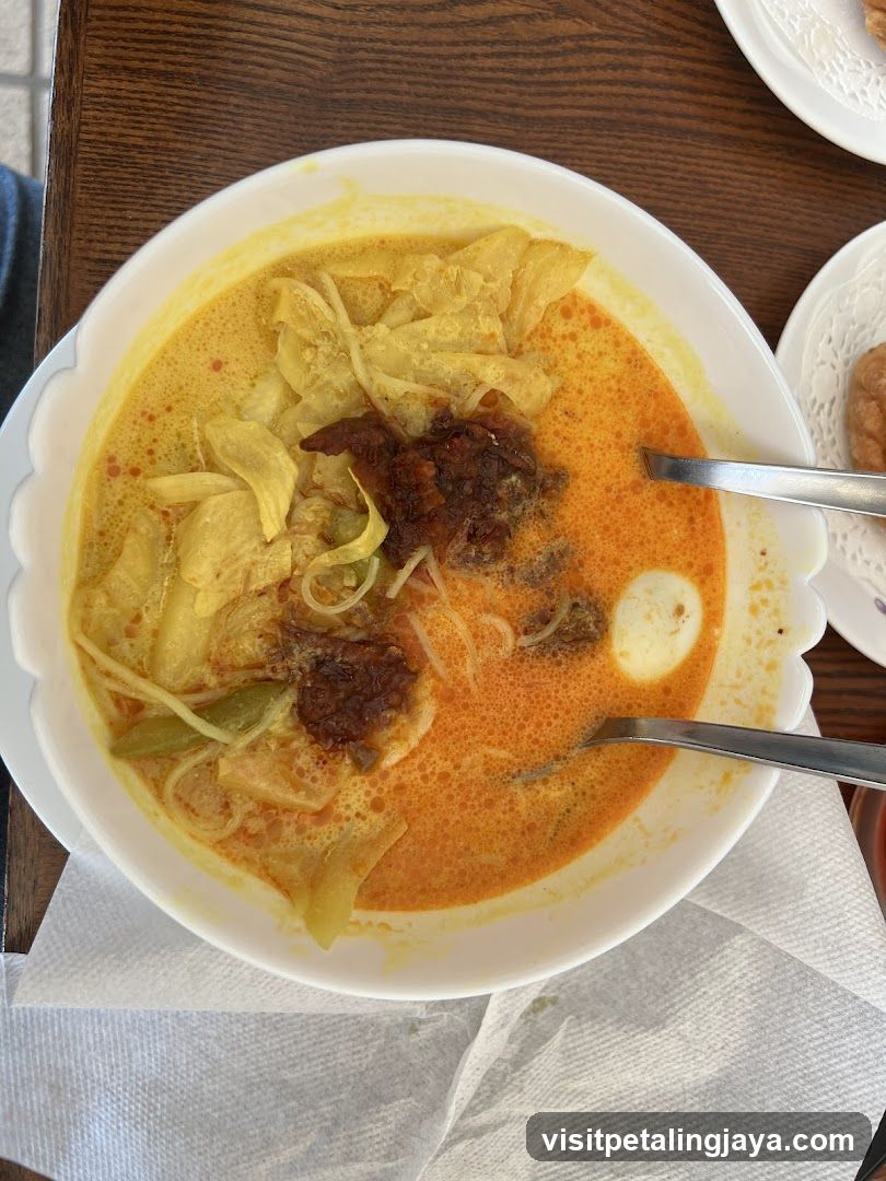Bowl of Curry Noodles with Egg and Spices