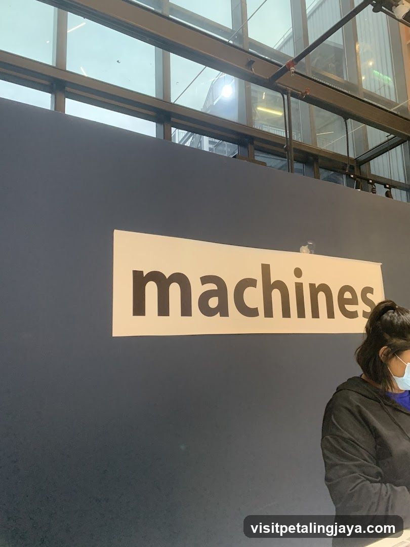 machines sign on wall