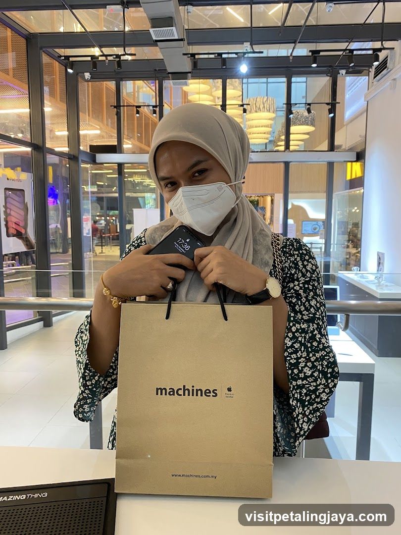 Person with shopping bag in mall