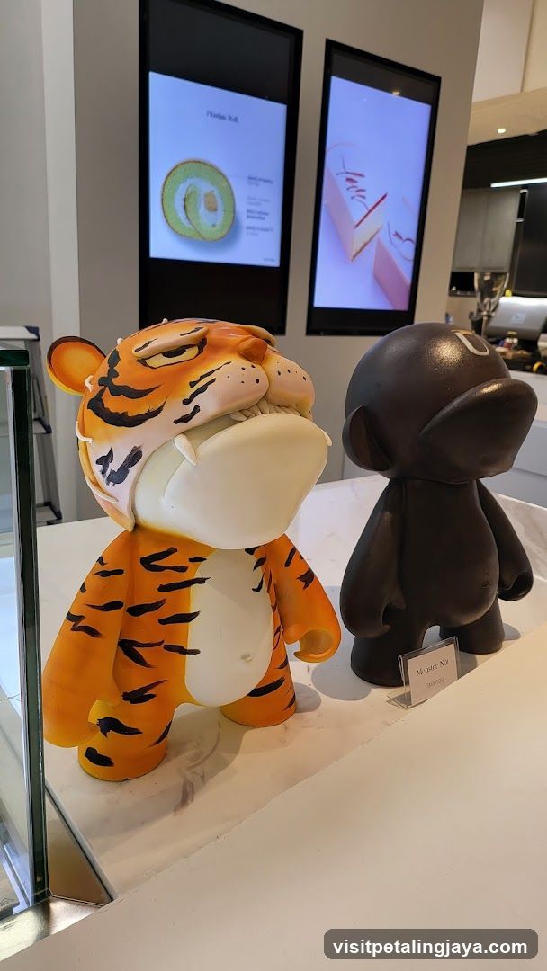 Tiger and Monkey Figurines Display