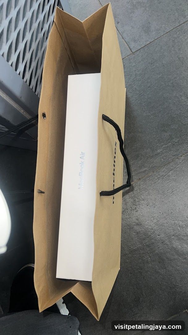 MacBook Air Box in Shopping Bag