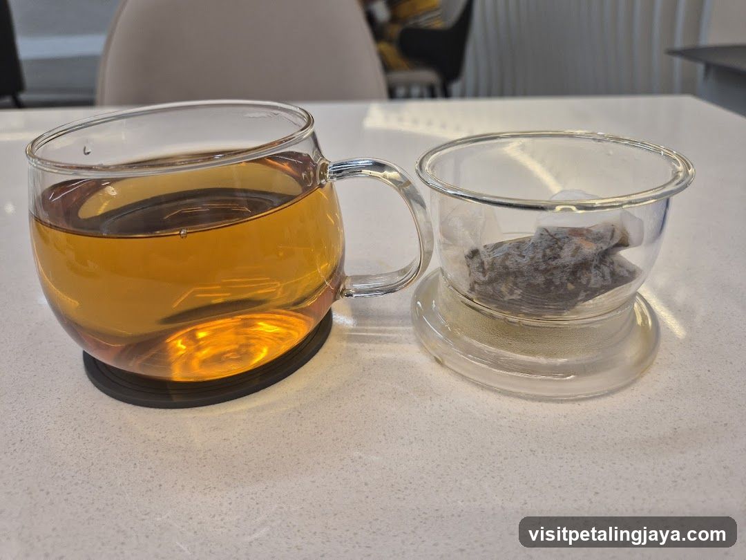 Tea Setup with Infused Tea and Tea Bag