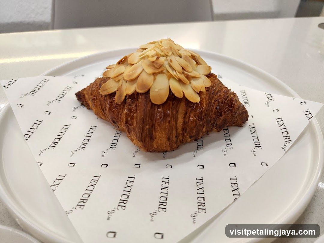 Almond Croissant on Textured Paper