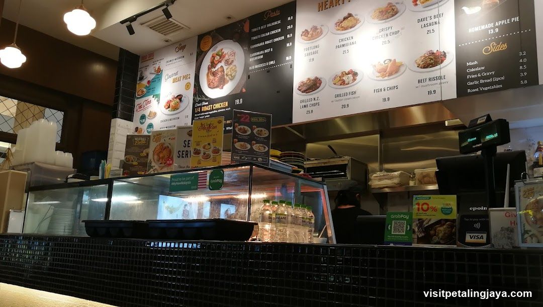 Restaurant Interior with Menu Board and Counter Display