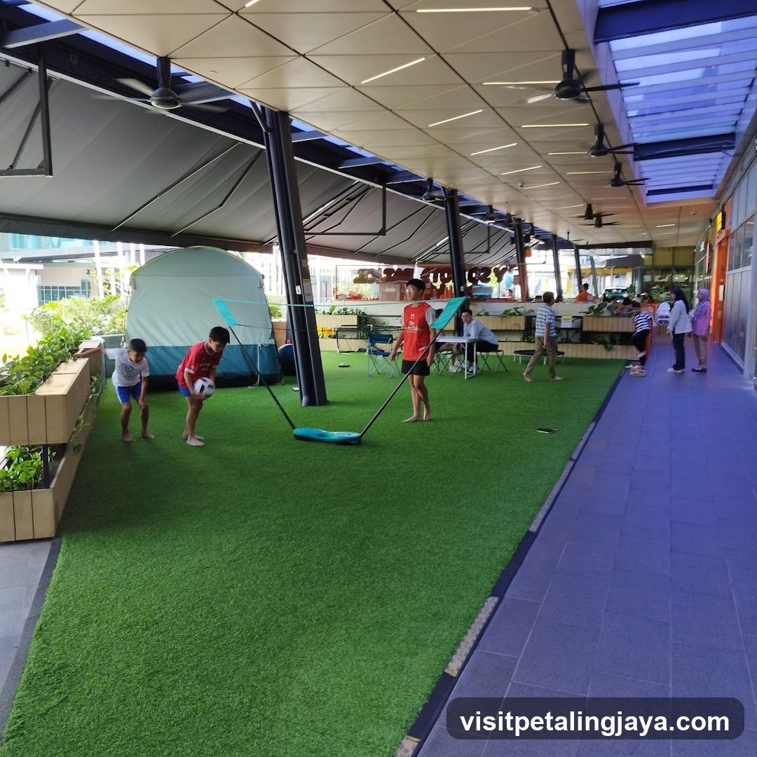 Outdoor Play Area with Kids Playing Soccer