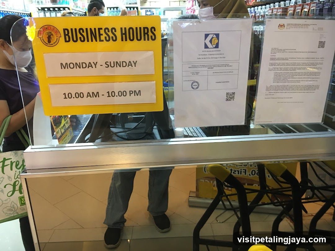 Storefront with Business Hours Sign
