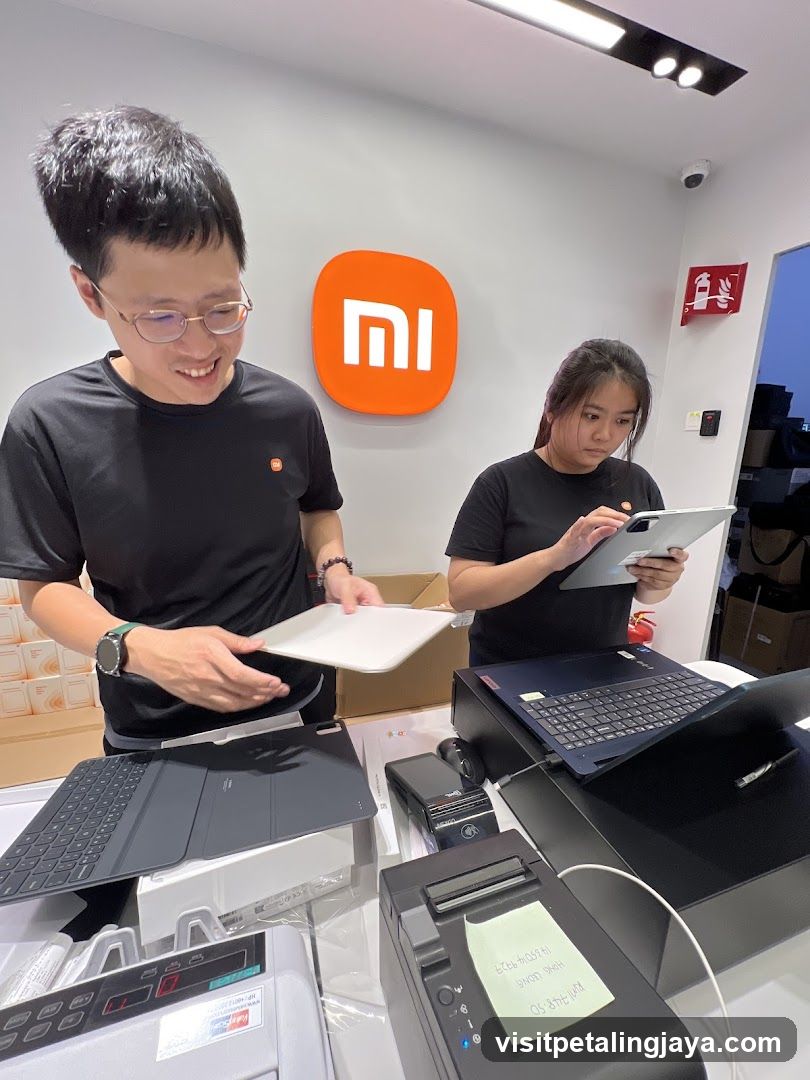 Tech Store Interior with Staff