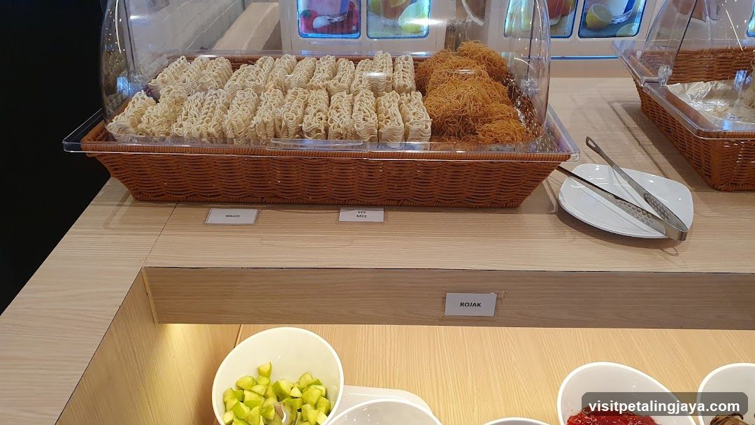 Food Display with Noodles and Side Dishes
