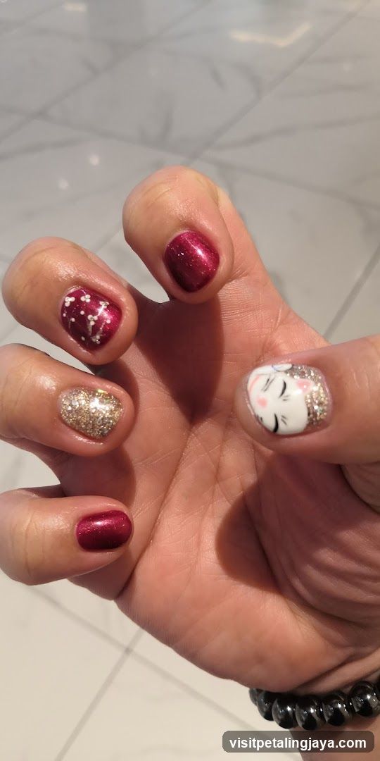 Hand with decorated nails