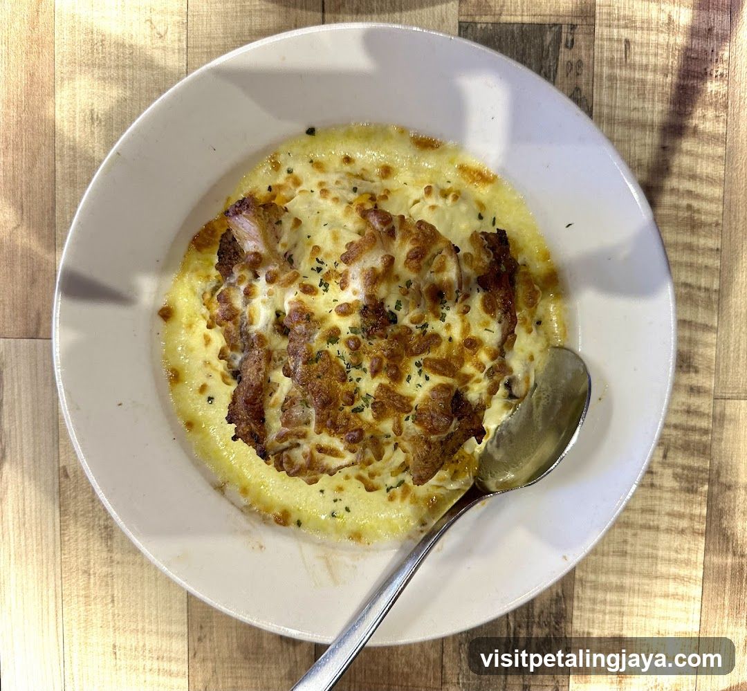 Cheesy Dish with Spoon