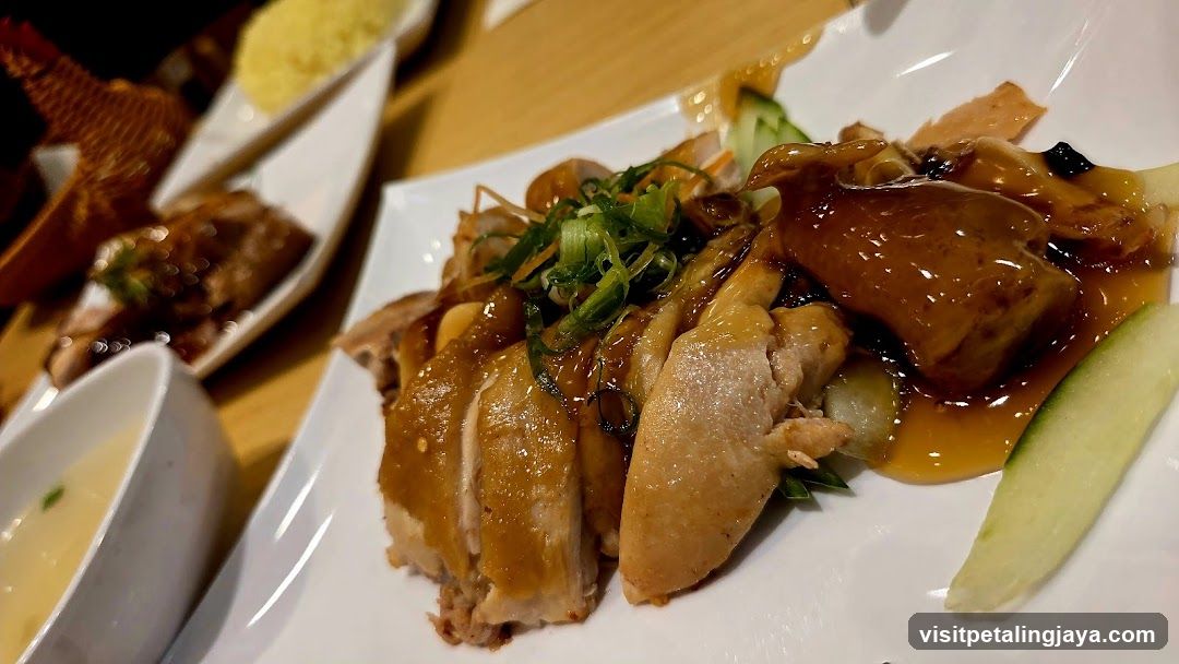 Hainanese Chicken Rice with Sauce and Garnishes