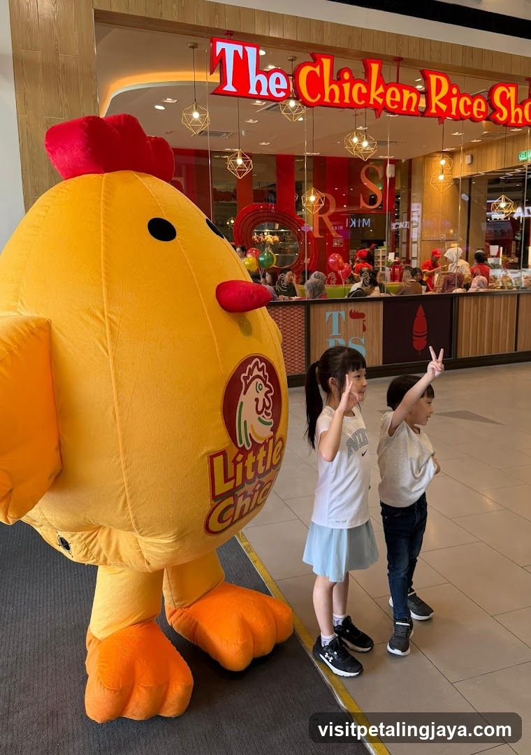 Kids with mascot at The Chicken Rice Shop